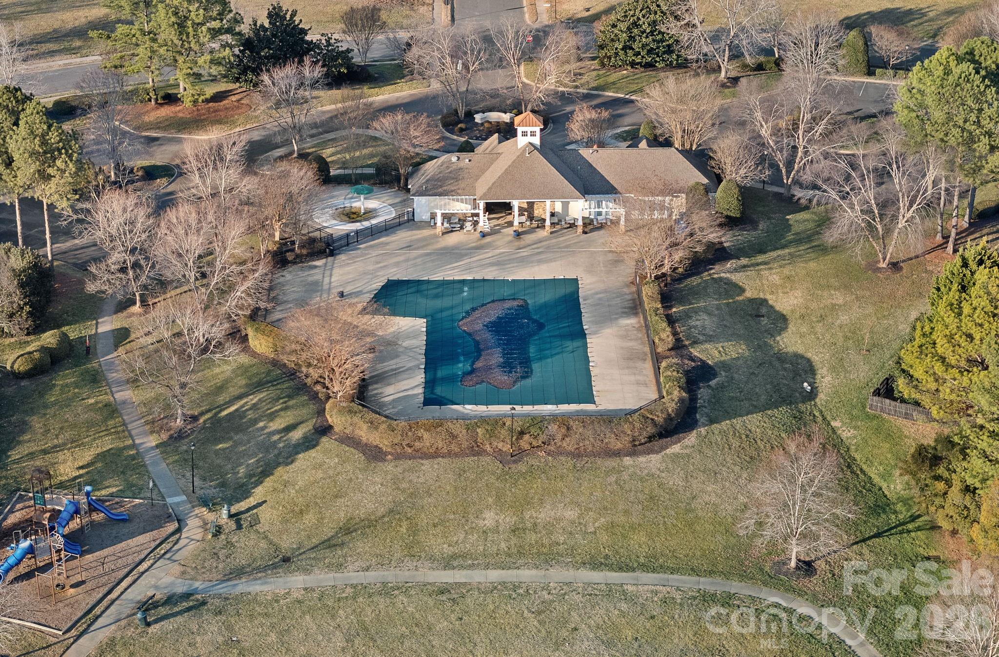 6110 Flowergate Lane Waxhaw, NC 28173 - Photo 39 of 39 an aerial view of a house with a yard and garage