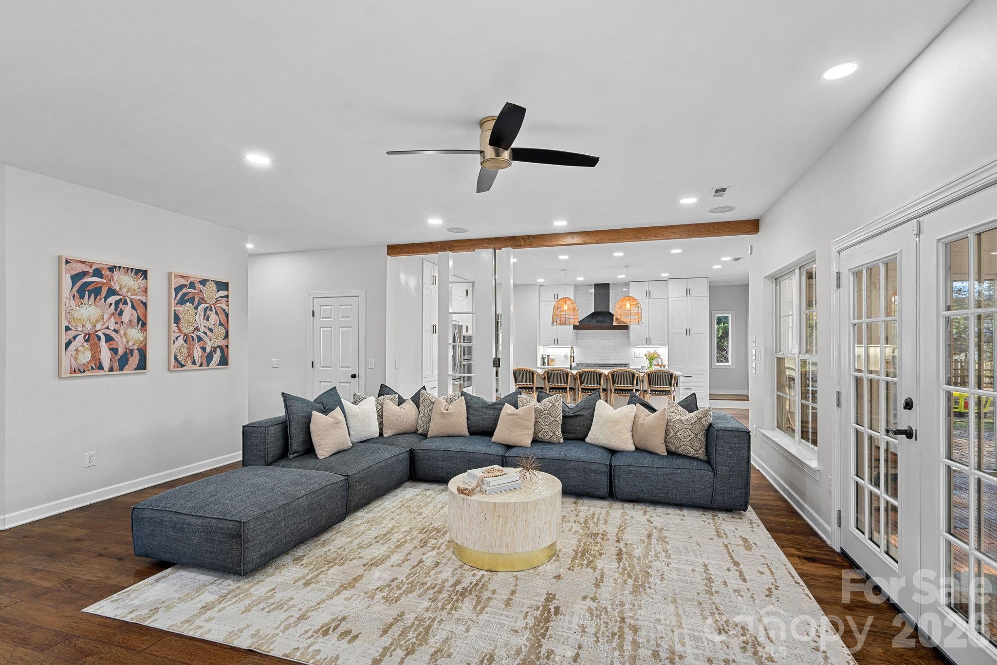 6110 Flowergate Lane Waxhaw, NC 28173 - Photo 9 of 39 a living room with furniture and a wooden floor