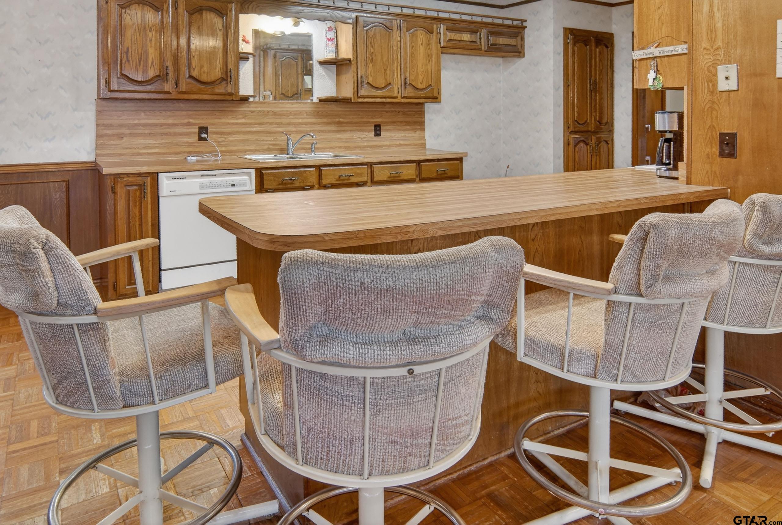 520 County Road 3445 Emory, TX 75440 - Photo 12 of 31 a view of a dining room with furniture and wooden floor