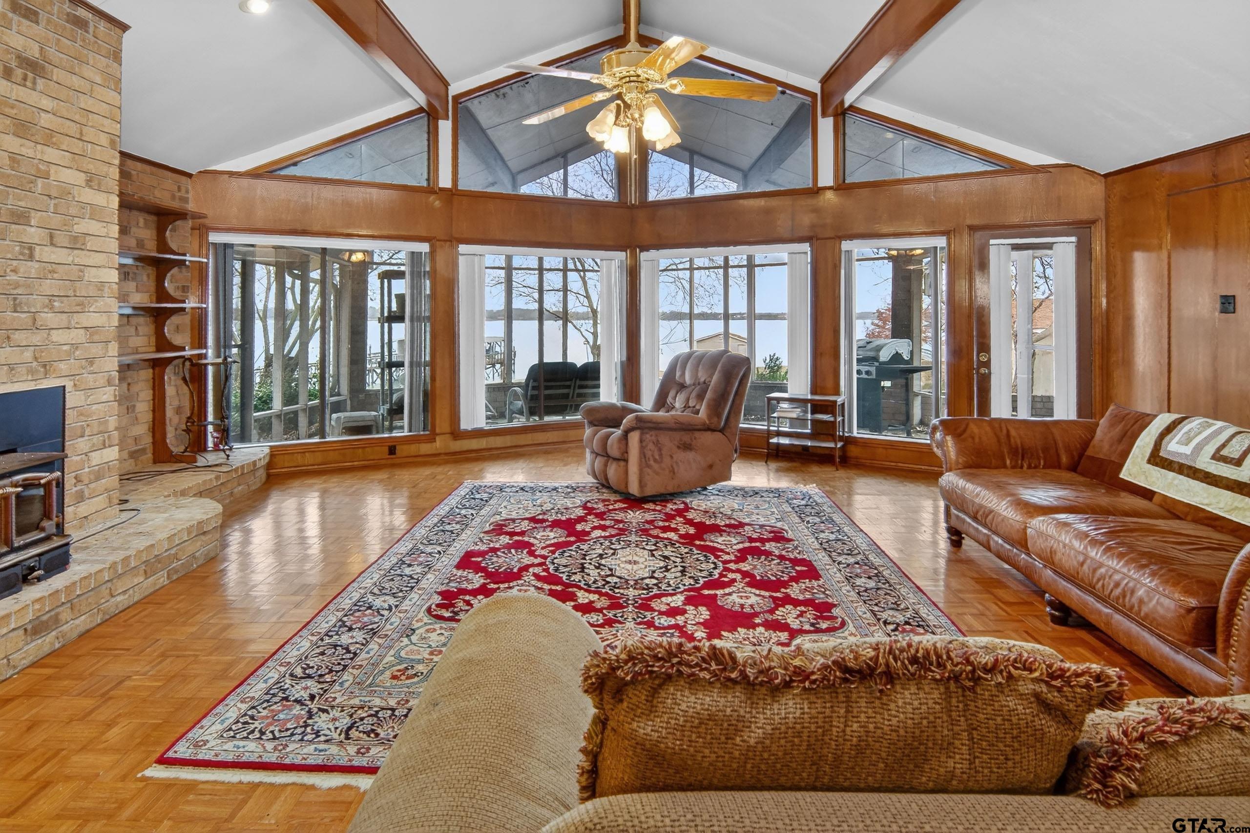 520 County Road 3445 Emory, TX 75440 - Photo 13 of 31 a bedroom with furniture and a large window