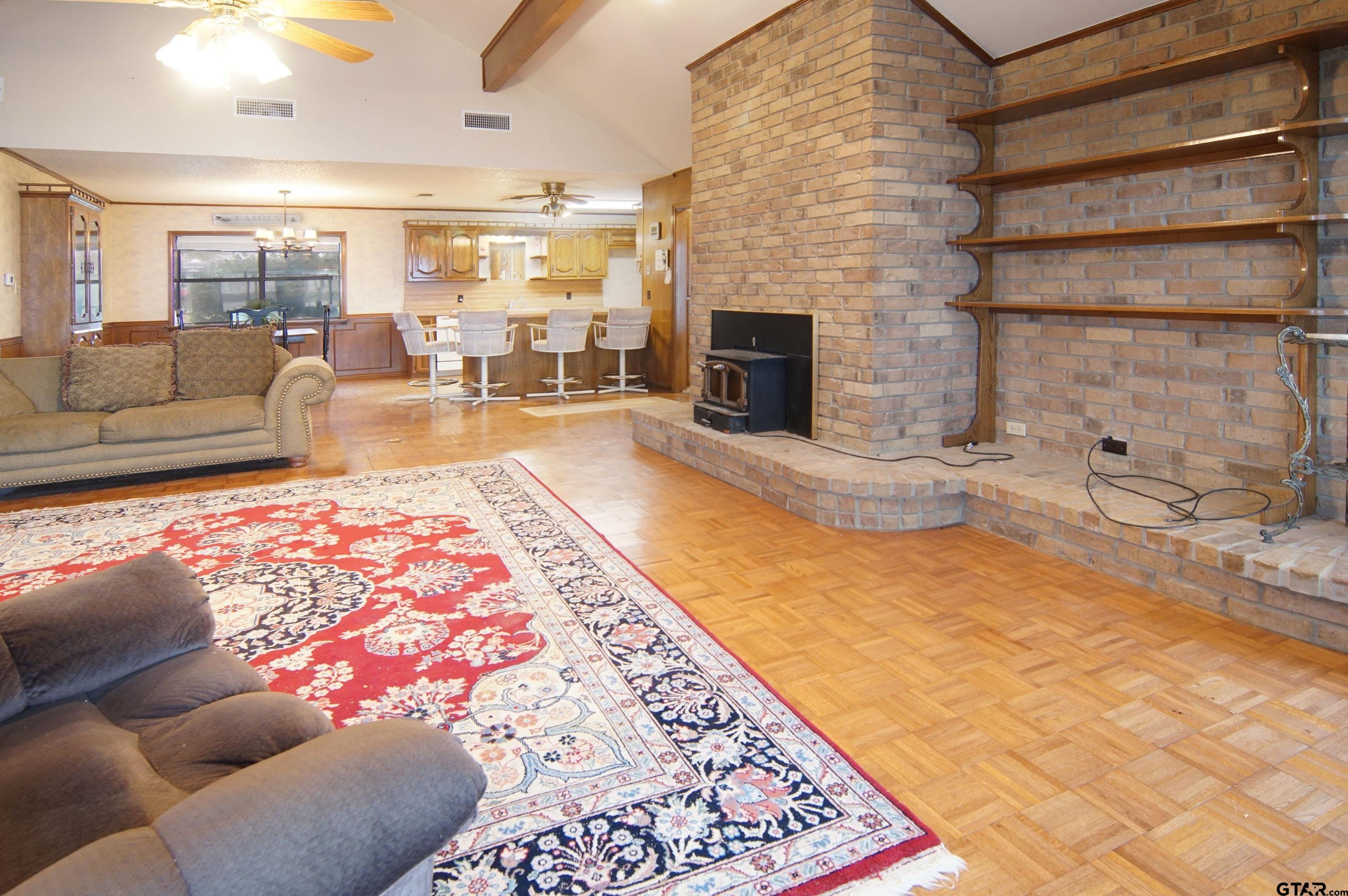 520 County Road 3445 Emory, TX 75440 - Photo 15 of 31 a living room with furniture and a fireplace