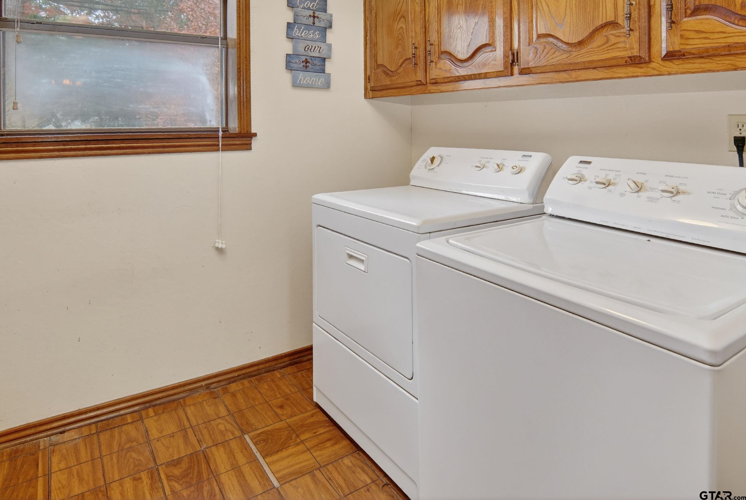 520 County Road 3445 Emory, TX 75440 - Photo 17 of 31 a view of storage and utility room with washer and dryer