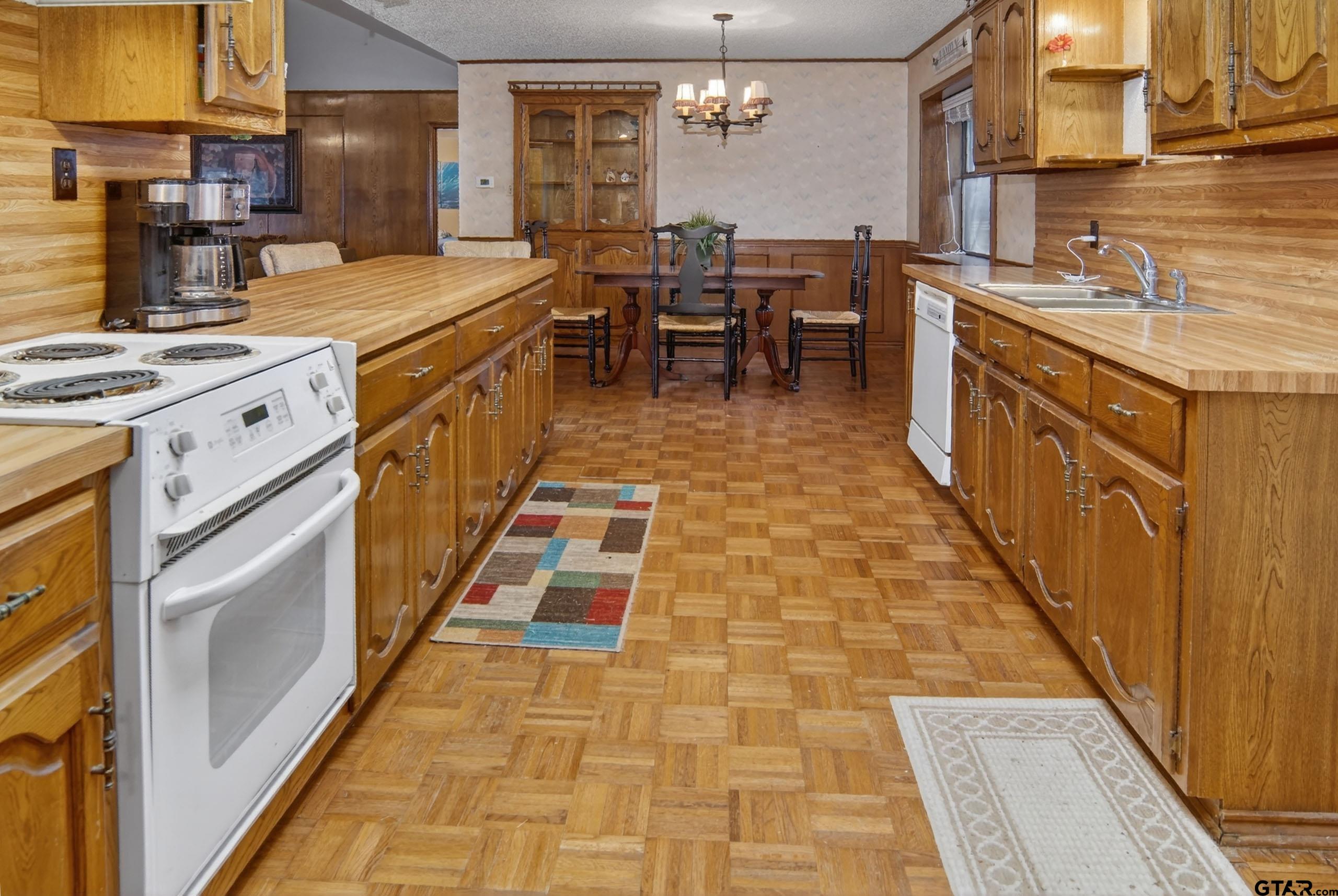 520 County Road 3445 Emory, TX 75440 - Photo 10 of 31 a kitchen with stainless steel appliances granite countertop lots of counter space and a sink