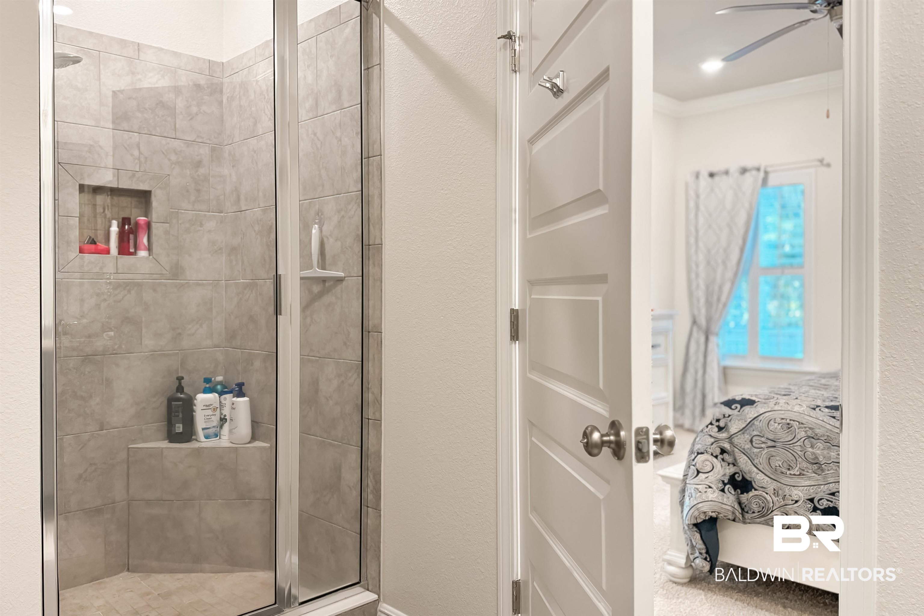 1290 Mako Loop Gulf Shores, AL 36542 - Photo 20 of 50 Bathroom with a shower stall, a ceiling fan, and ensuite bathroom