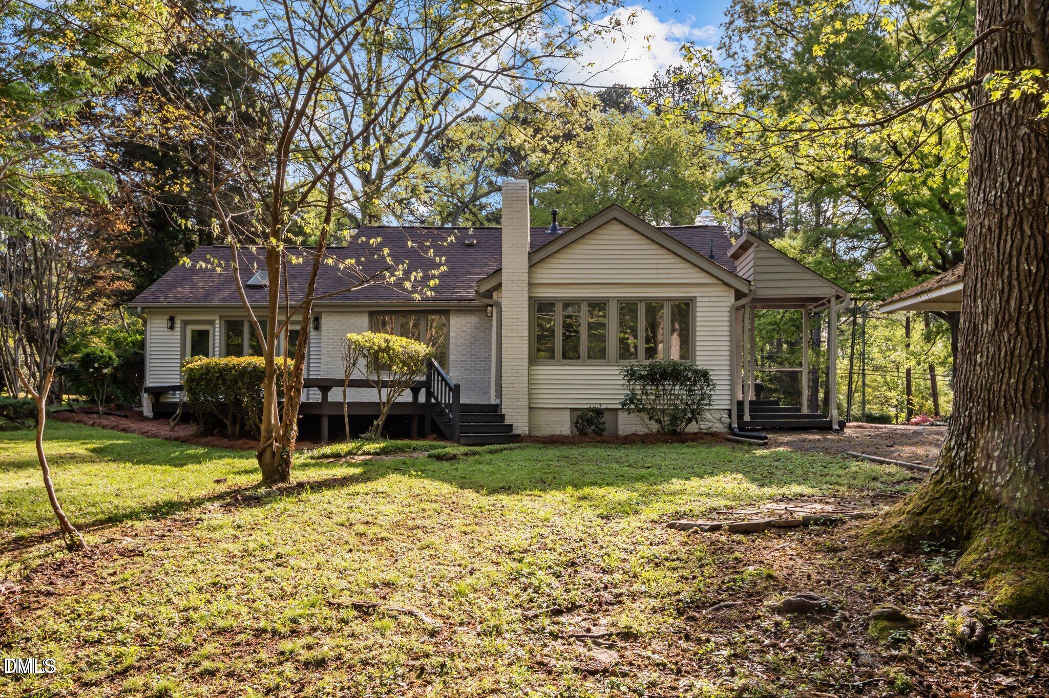 3014 Hope Valley Road Durham, NC 27707 - Photo 13 of 15 a view of a house with backyard porch and sitting area