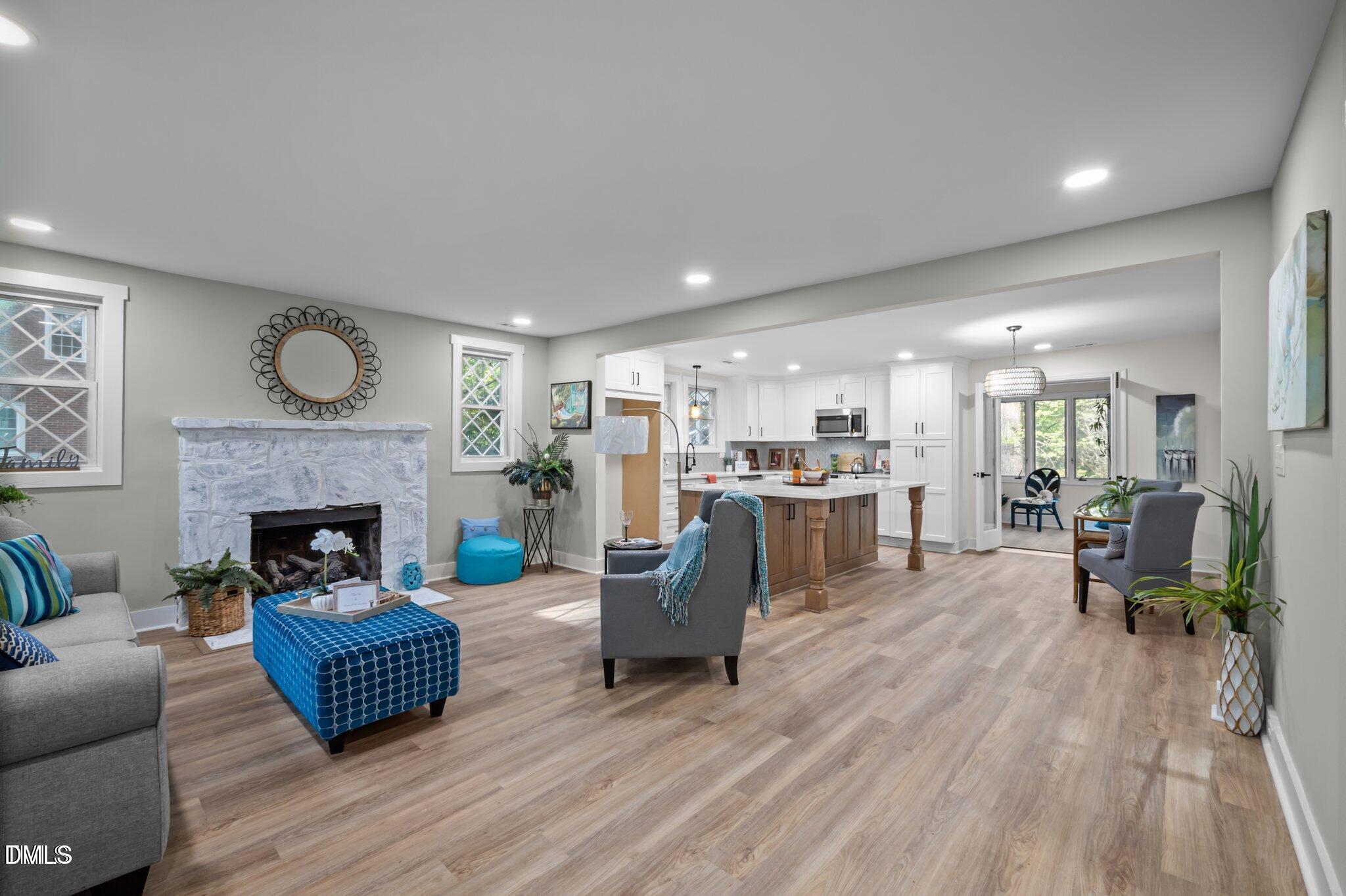 3014 Hope Valley Road Durham, NC 27707 - Photo 4 of 15 a living room with furniture and a fireplace