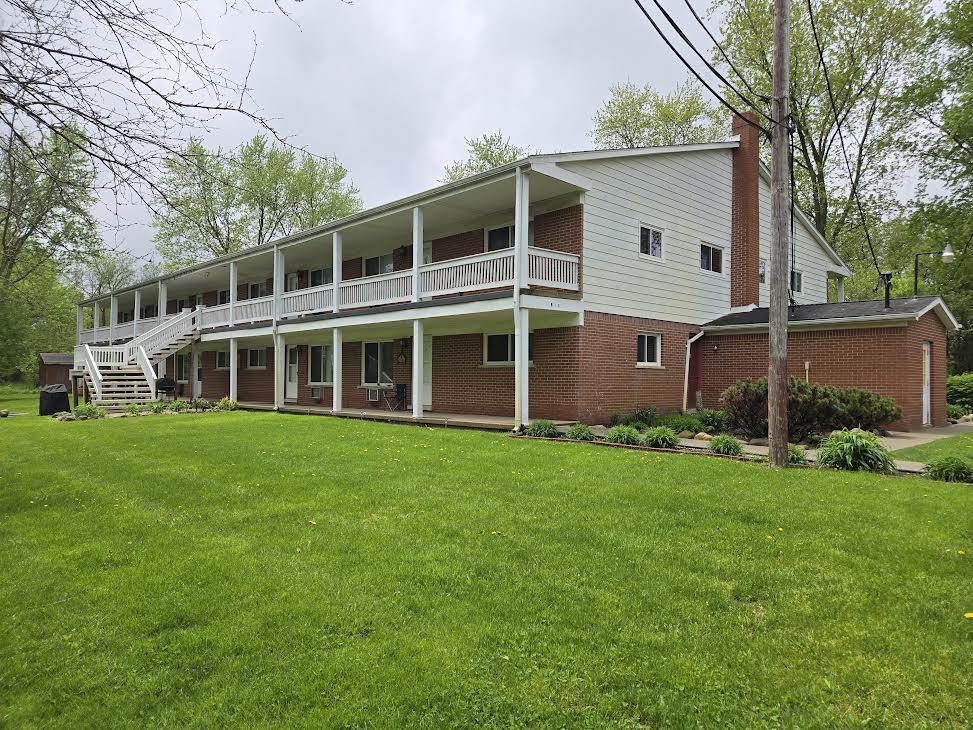 59425 10 Mile Road, Unit 4B South Lyon, MI 48178 - Photo 1 of 11 0-2