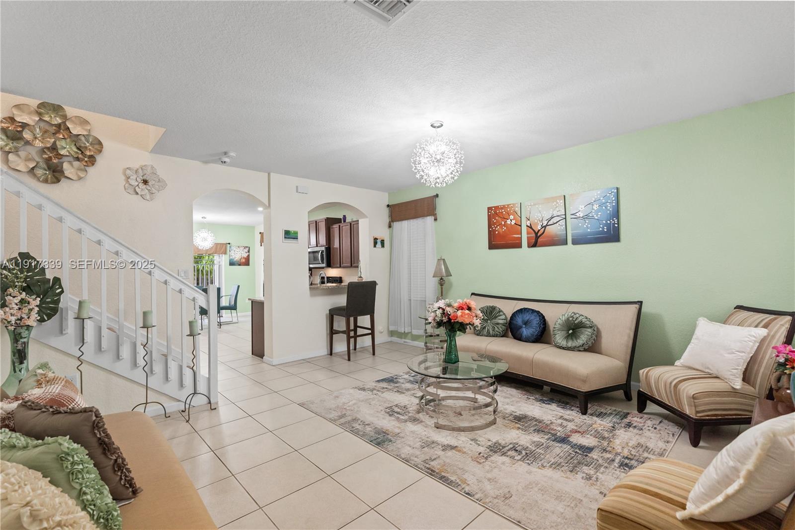 11121 Southwest 225th Terrace Miami, FL 33170 - Photo 26 of 41 a living room with furniture and wooden floor