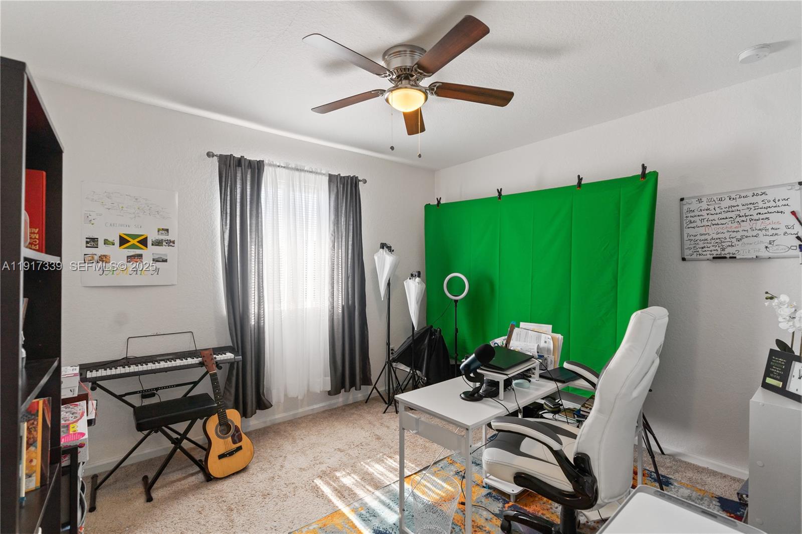 11121 Southwest 225th Terrace Miami, FL 33170 - Photo 31 of 41 a work room with furniture and a large window