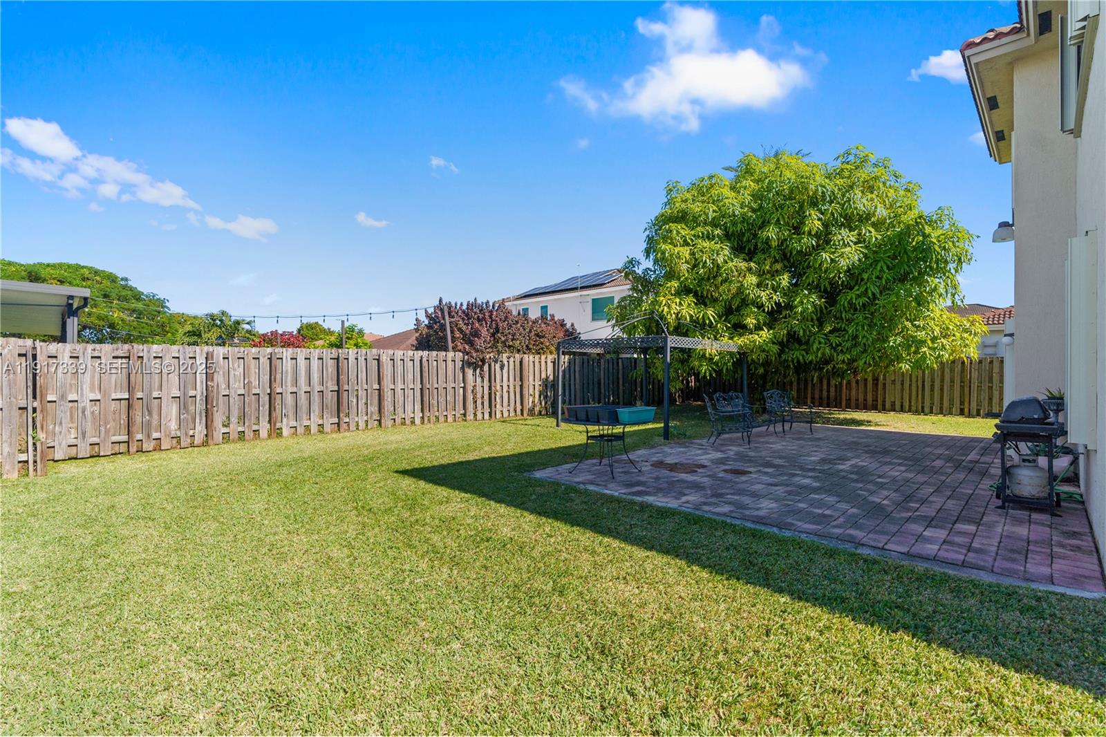 11121 Southwest 225th Terrace Miami, FL 33170 - Photo 6 of 41 a view of a backyard with green space