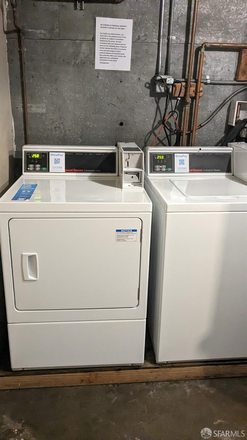 201 Waller Street San Francisco, CA 94102 - Photo 16 of 17 a utility room with dryer and washer
