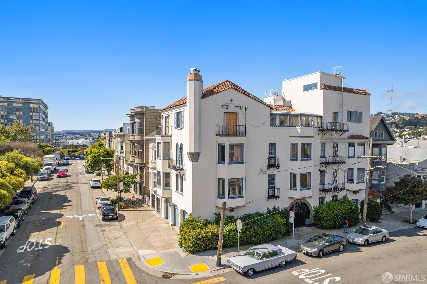 201 Waller Street San Francisco, CA 94102 - Photo 3 of 17 a view of a street with cars