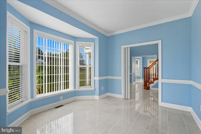 a bathroom with a double vanity sink toilet mirror and shower