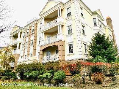 321 Oval Road Manasquan, NJ 08736 - Photo 1 of 23 a front view of a building with a garden