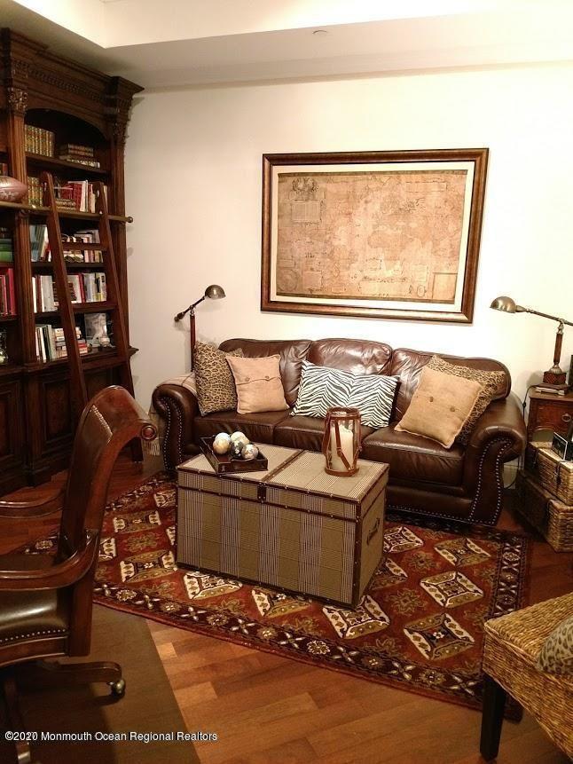 321 Oval Road Manasquan, NJ 08736 - Photo 18 of 23 a living room with furniture and a window