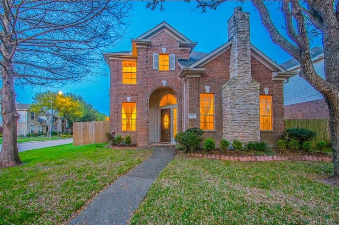 a house view with a outdoor space