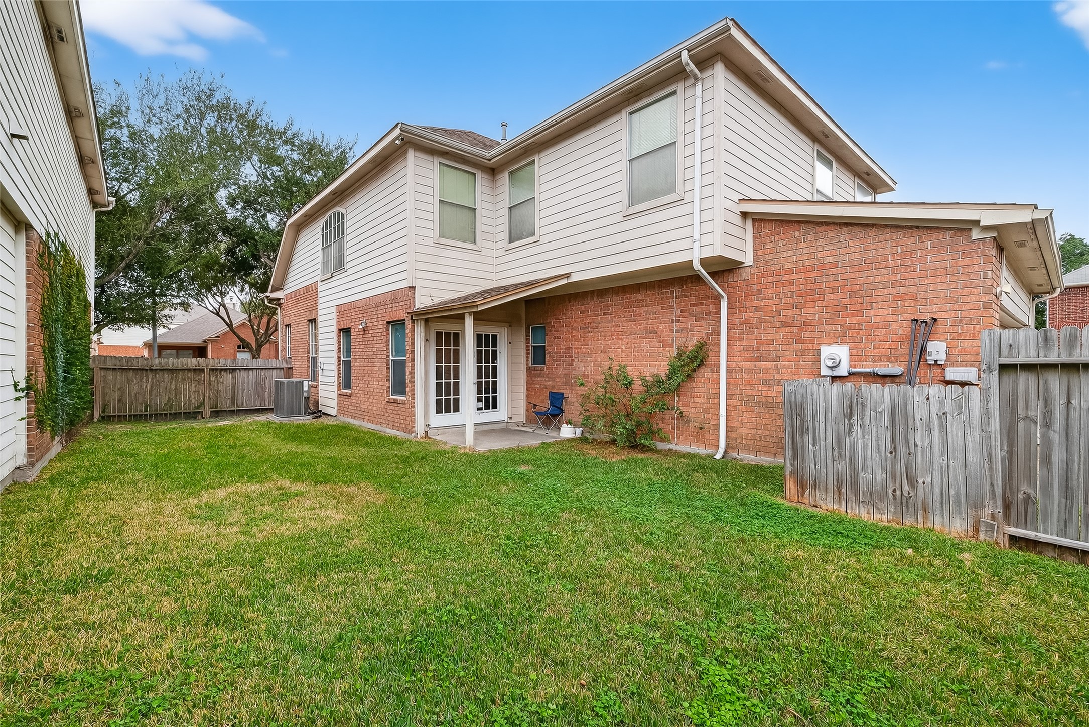 15903 Timber Chase Drive Houston, TX 77082 - Photo 13 of 20 a view of a house with backyard and a tree