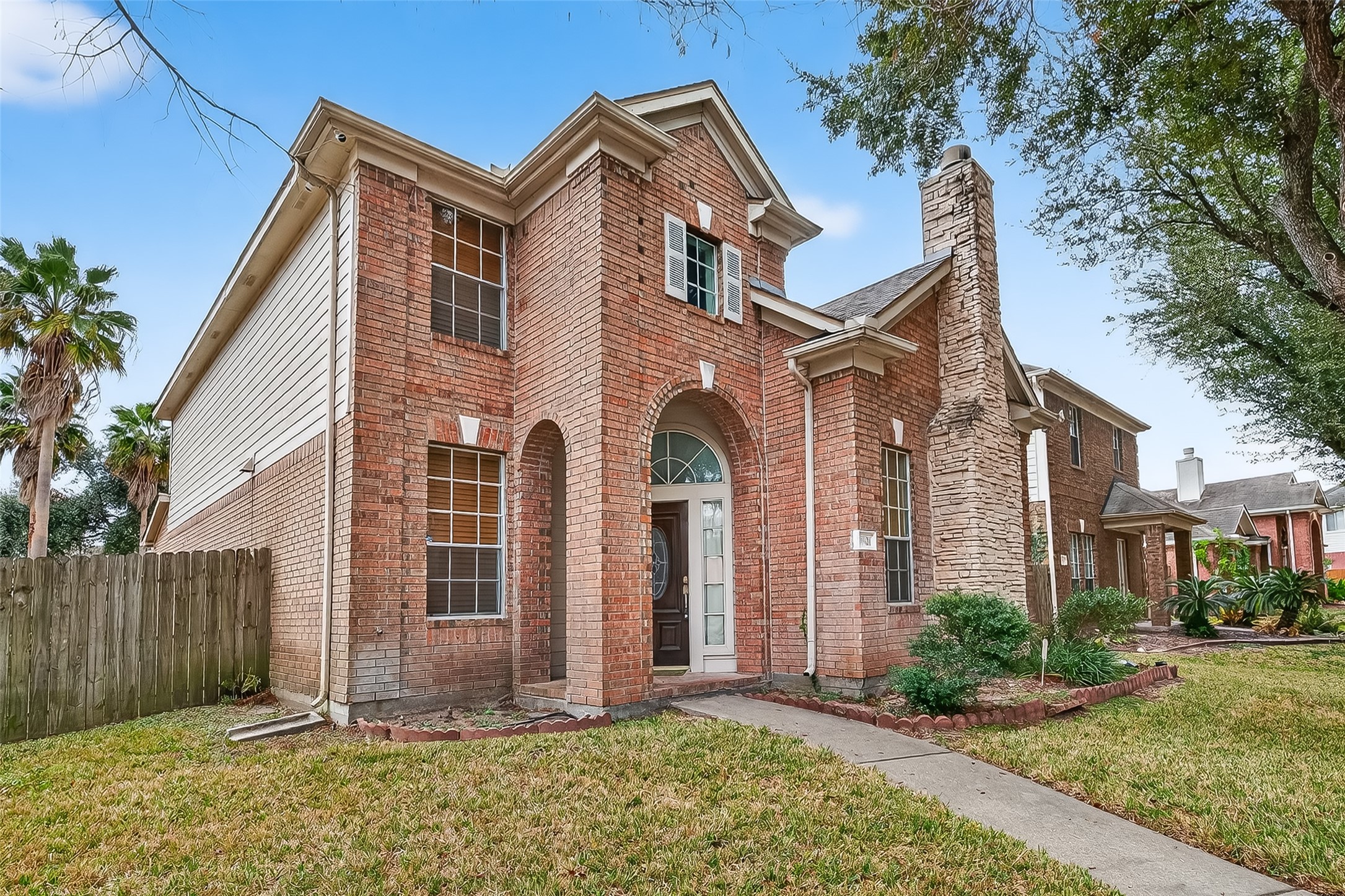 15903 Timber Chase Drive Houston, TX 77082 - Photo 4 of 20 a front view of a house with garden