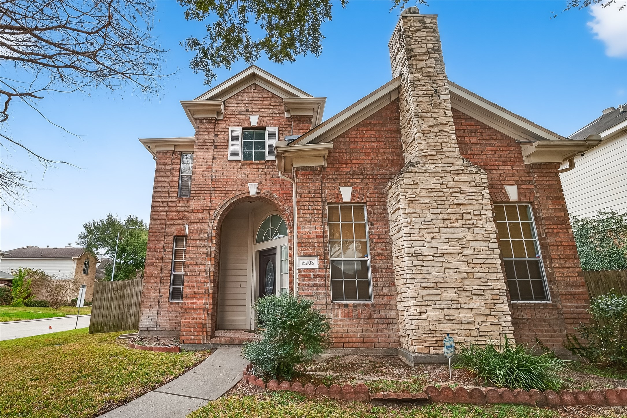 15903 Timber Chase Drive Houston, TX 77082 - Photo 6 of 20 a front view of a house with garden