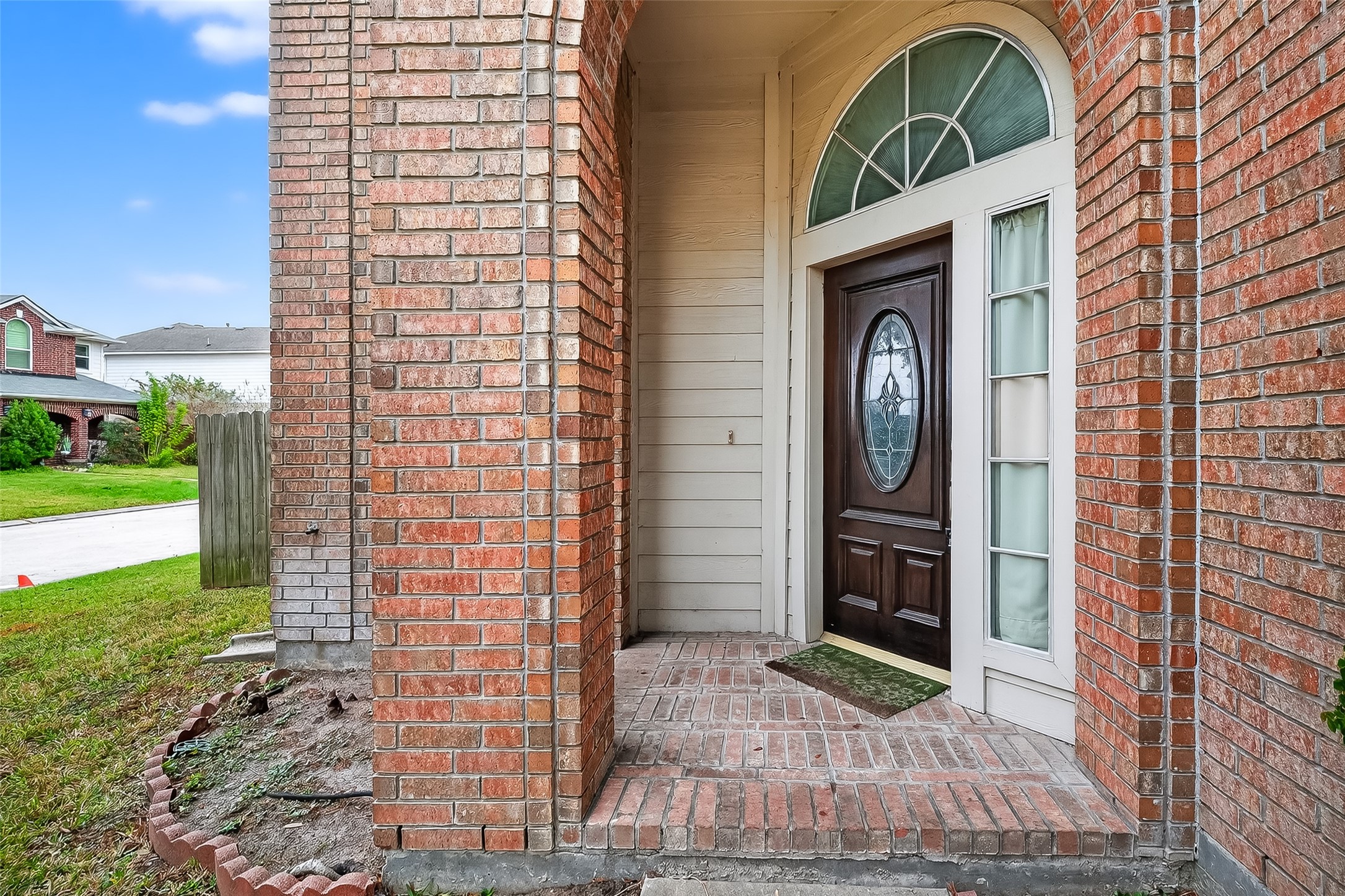 15903 Timber Chase Drive Houston, TX 77082 - Photo 8 of 20 a front view of a house with garden