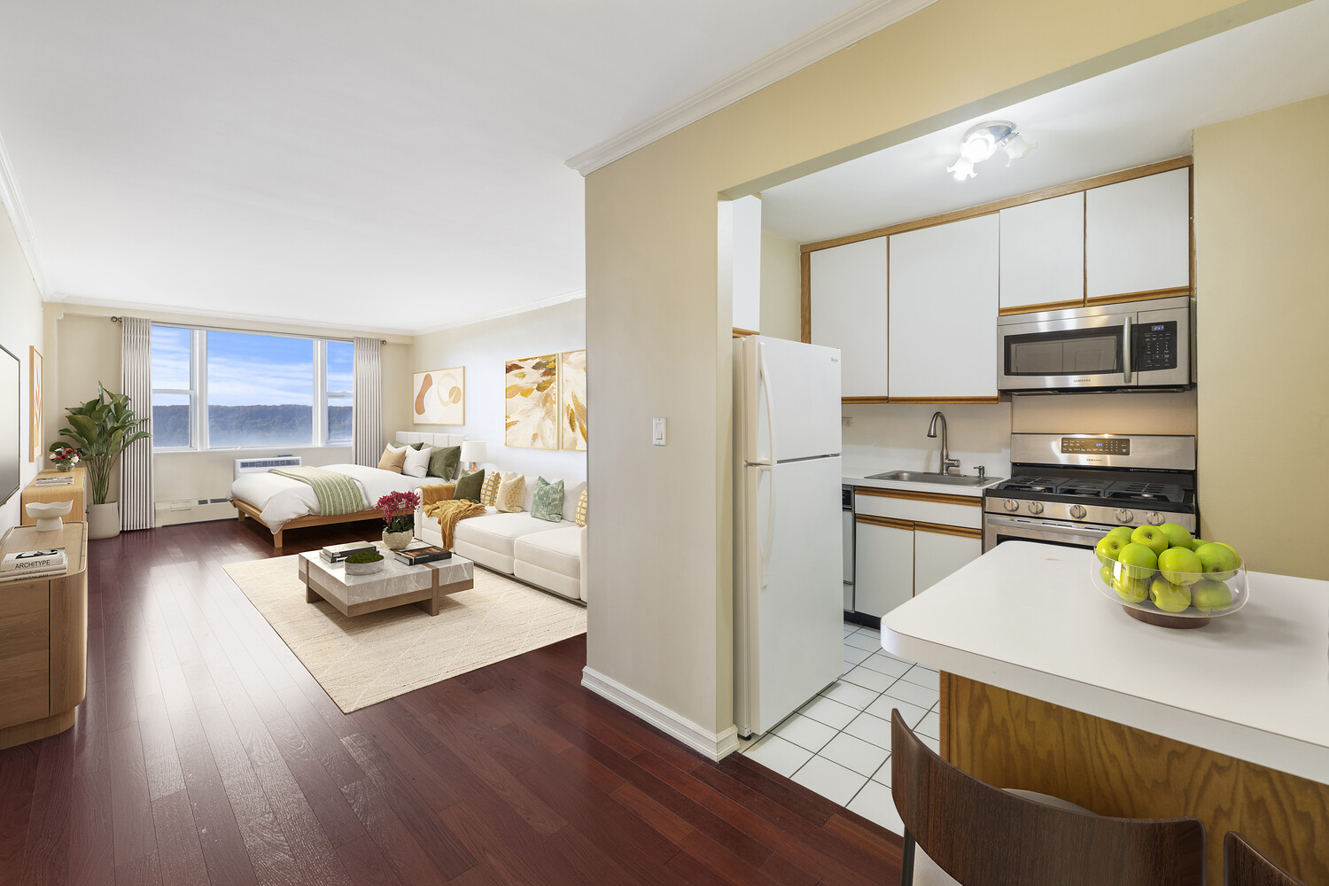 5700 Arlington Avenue, Unit 17N Bronx, NY 10471 - Photo 4 of 16 a kitchen with stainless steel appliances a stove a sink a refrigerator white cabinets and wooden floor