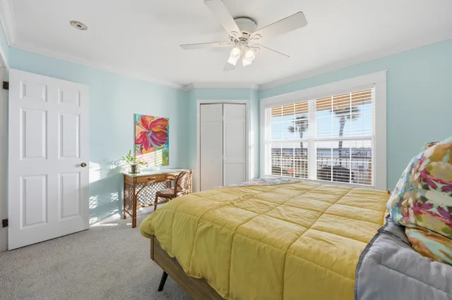 a bathroom with a sink toilet and mirror
