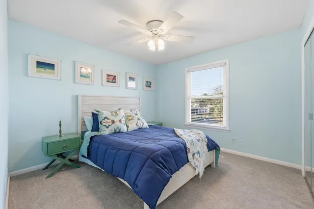 a view of a balcony with chair and dining table