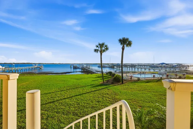 a view of a swimming pool with a table and chairs