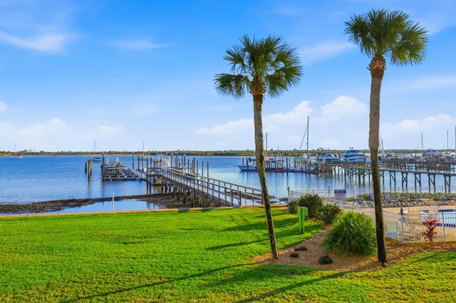 a view of a swimming pool with a lounge chair