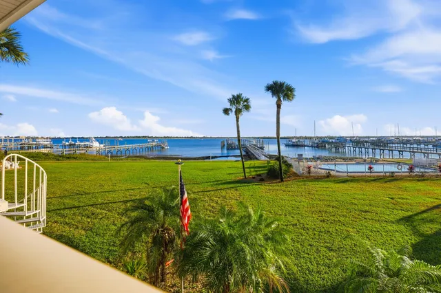 a view of a balcony with chairs