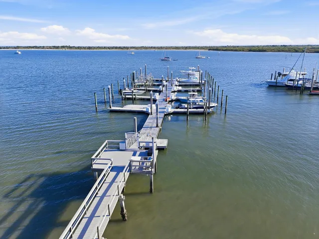 a picture of a bench in front of a wall