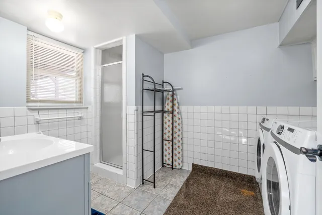 a bathroom with a sink and mirror
