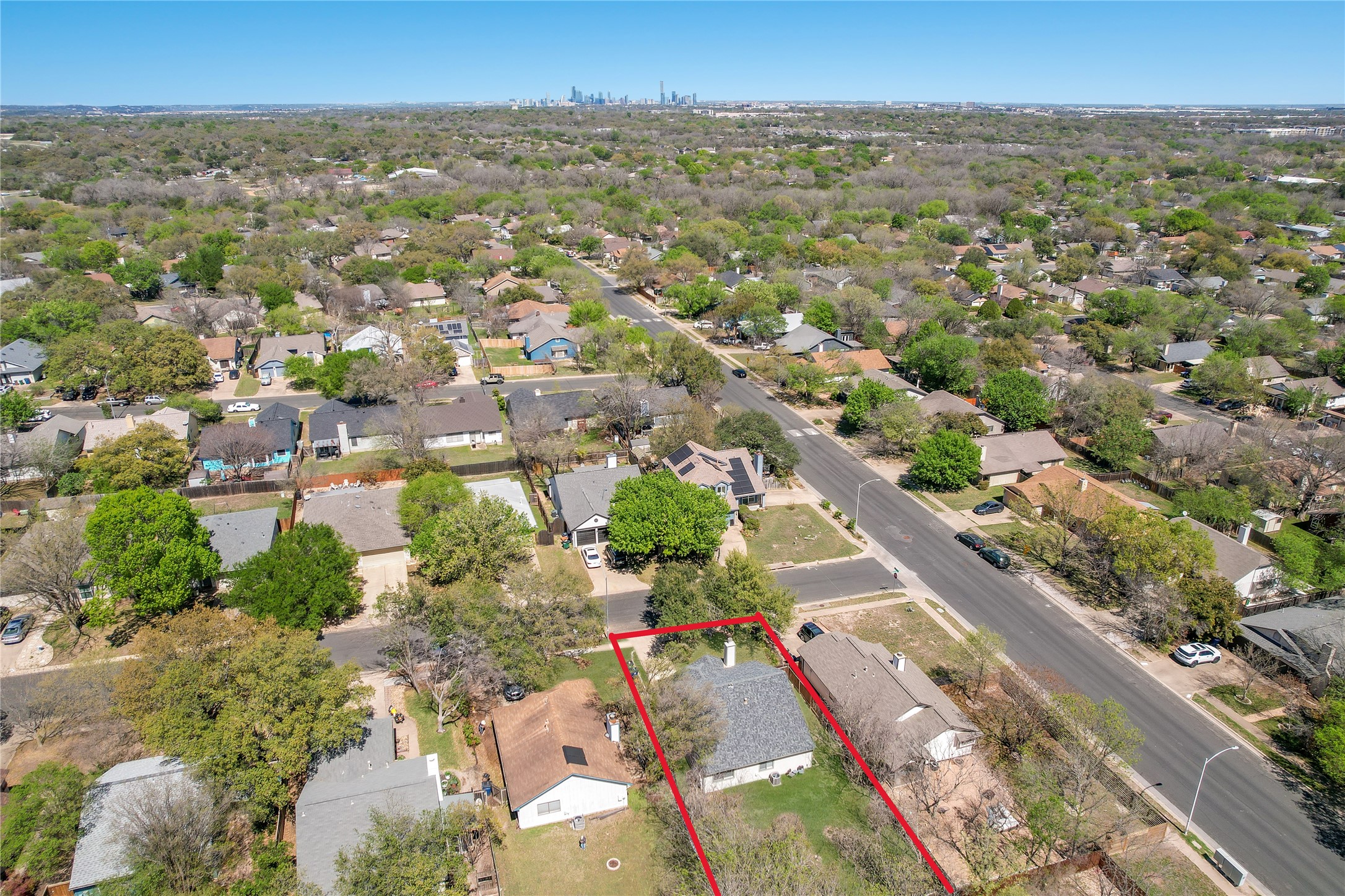 803 Kavanagh Drive Austin, TX 78748 - Photo 25 of 26 Aerial perspective of suburban area with property parcel outlined
