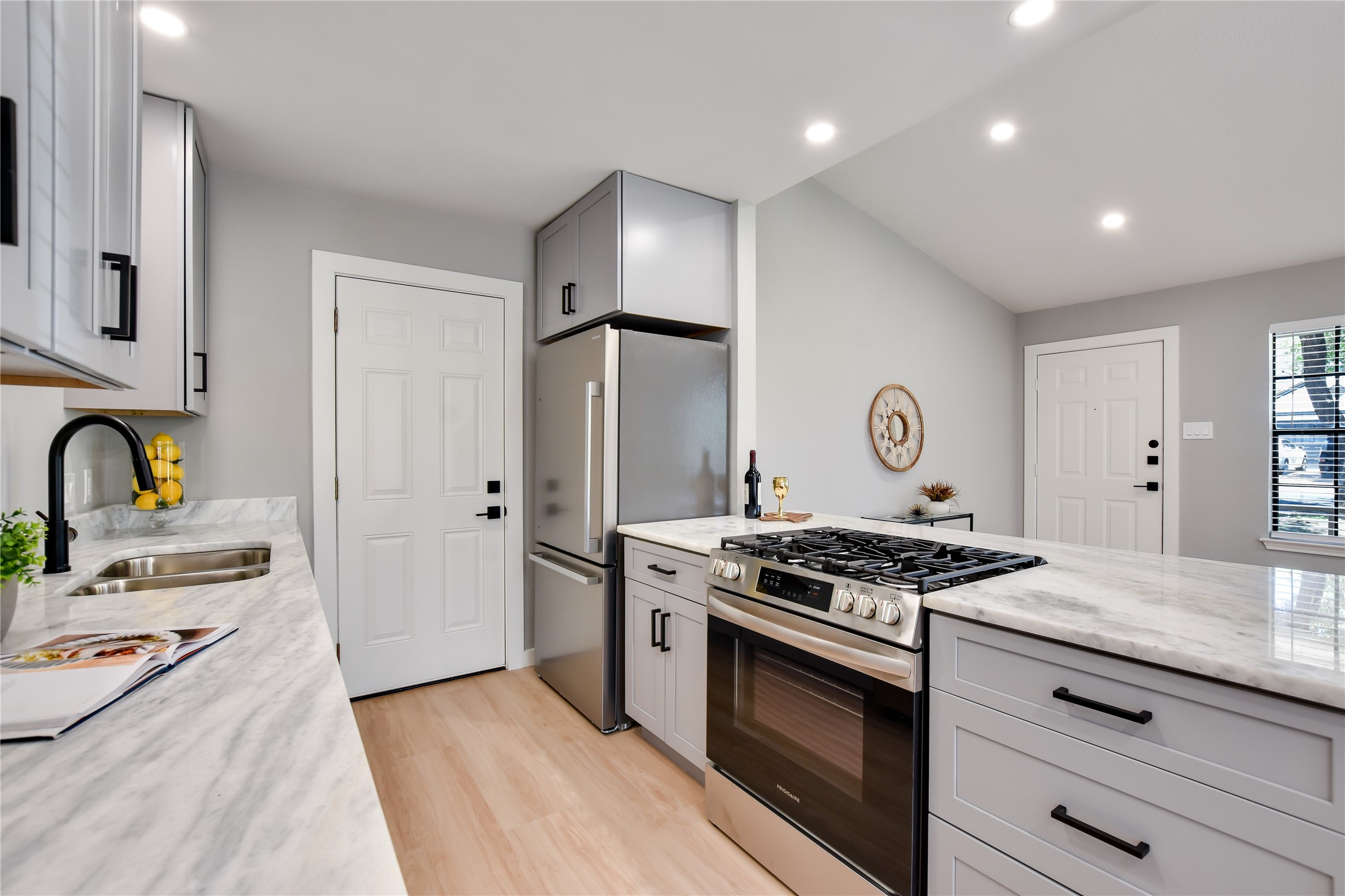 803 Kavanagh Drive Austin, TX 78748 - Photo 9 of 26 floors, and gray cabinets