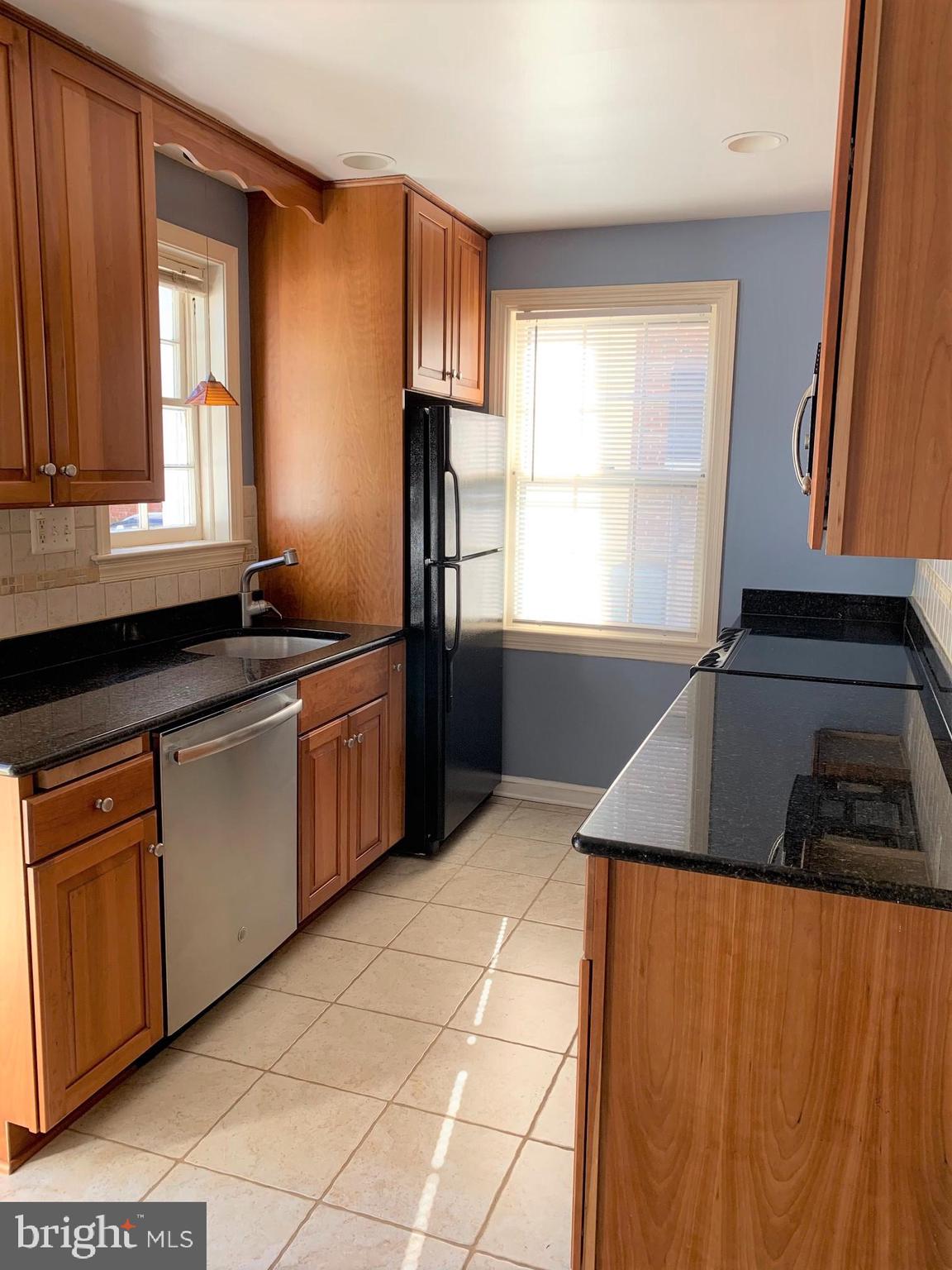 7807 Glenbrook Road Bethesda, MD 20814 - Photo 12 of 25 Tastefully designed cherry kitchen