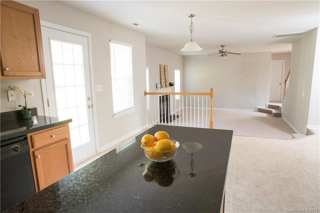 5207 Sunriver Road, Unit 52 Gastonia, NC 28054 - Photo 12 of 24 a view of kitchen and windows