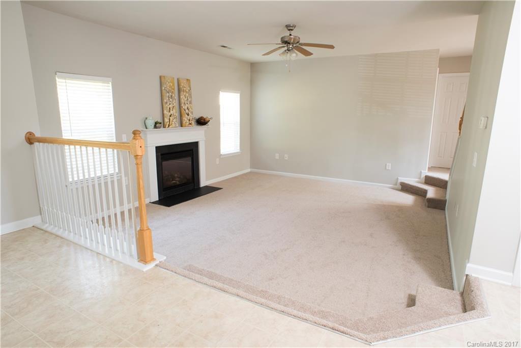 5207 Sunriver Road, Unit 52 Gastonia, NC 28054 - Photo 13 of 24 a view of a livingroom with a fireplace