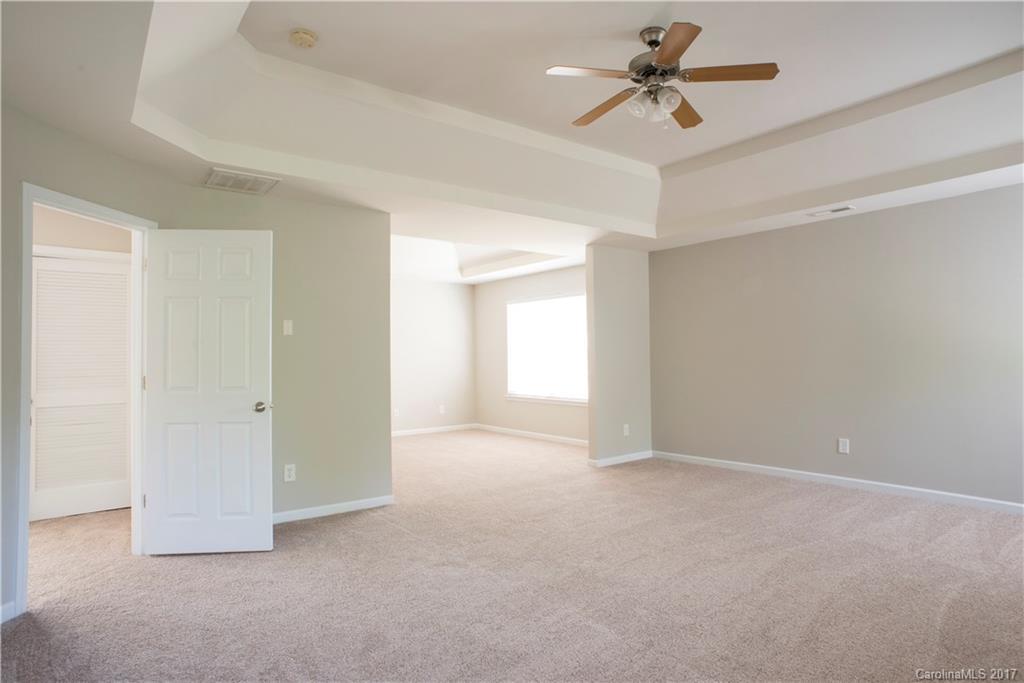5207 Sunriver Road, Unit 52 Gastonia, NC 28054 - Photo 18 of 24 wooden floor in an empty room