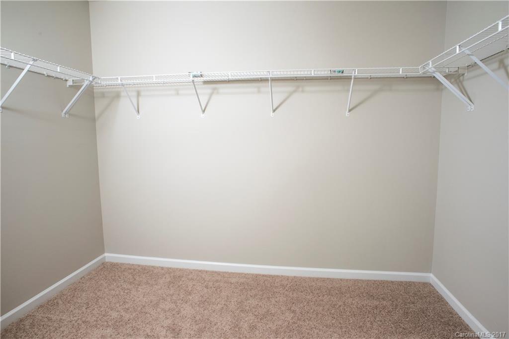 5207 Sunriver Road, Unit 52 Gastonia, NC 28054 - Photo 24 of 24 a view of an empty walk in closet