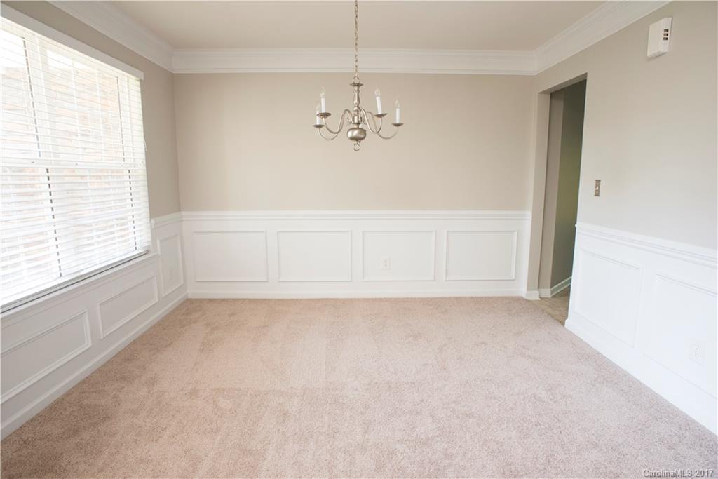 5207 Sunriver Road, Unit 52 Gastonia, NC 28054 - Photo 6 of 24 a view of an empty room with a window