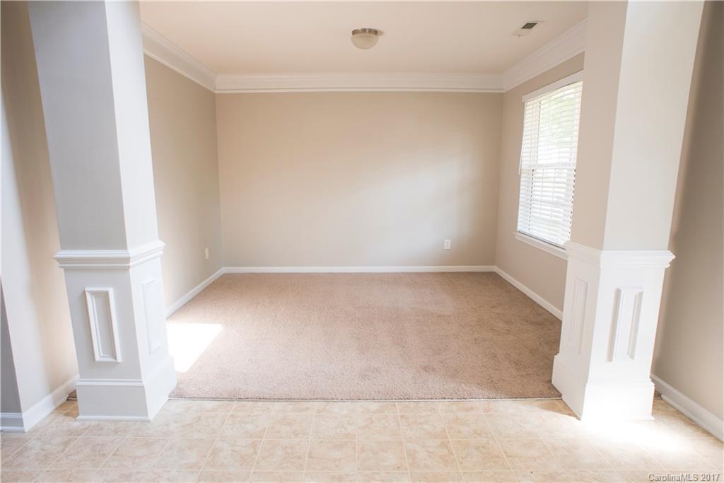 5207 Sunriver Road, Unit 52 Gastonia, NC 28054 - Photo 7 of 24 an empty room with windows