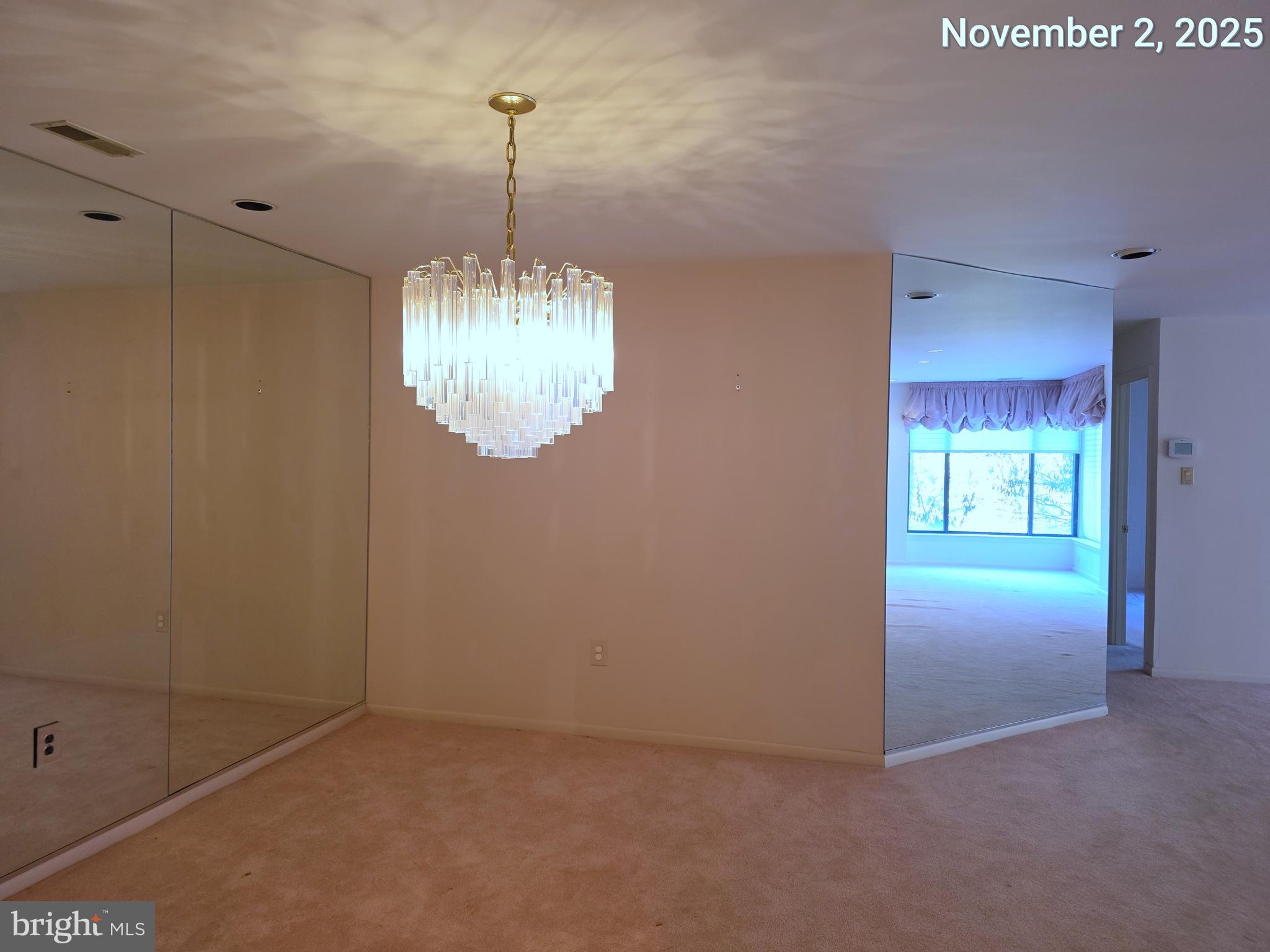 3031 Fallstaff Road, Unit 306C Baltimore, MD 21209 - Photo 11 of 23 a view of an empty room with window