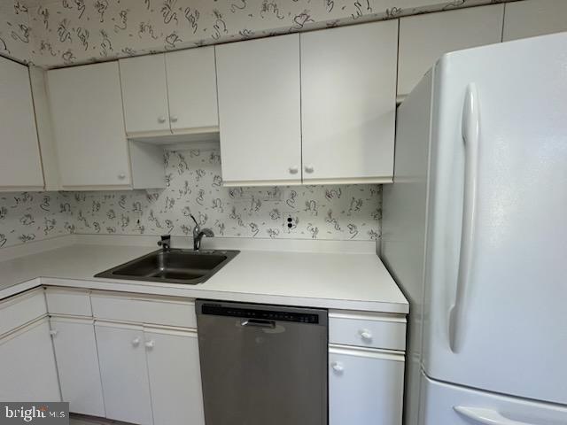 3031 Fallstaff Road, Unit 306C Baltimore, MD 21209 - Photo 12 of 23 a kitchen with a sink and cabinets