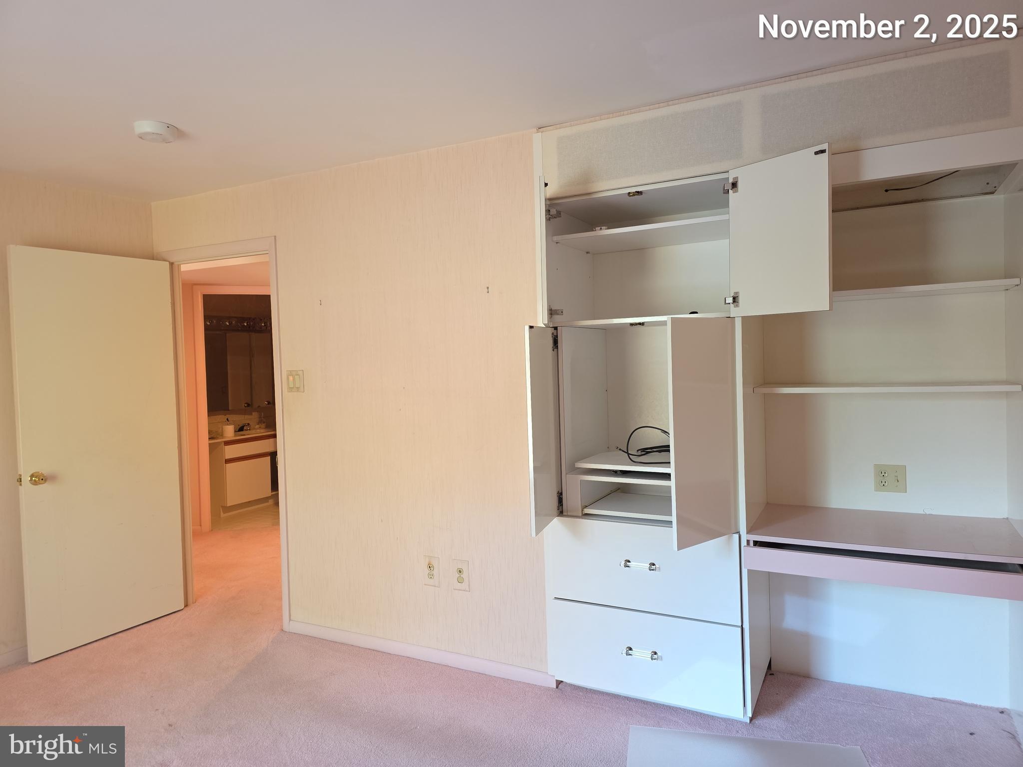 3031 Fallstaff Road, Unit 306C Baltimore, MD 21209 - Photo 16 of 23 a kitchen with cabinets and appliances