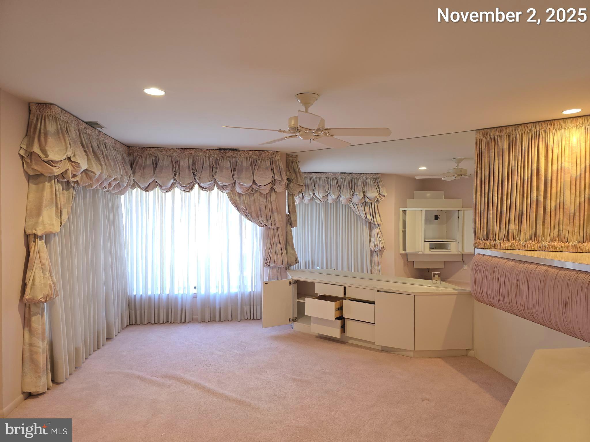 3031 Fallstaff Road, Unit 306C Baltimore, MD 21209 - Photo 17 of 23 a room with a bed and a large window