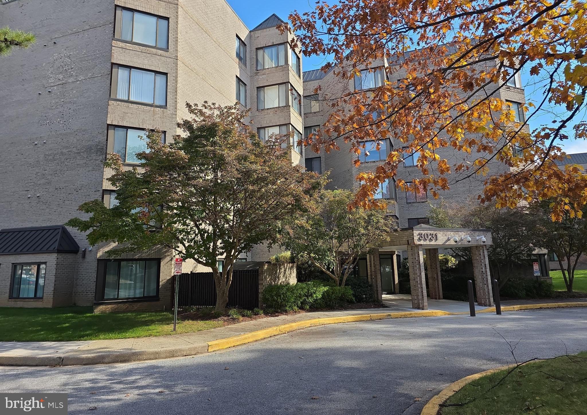 3031 Fallstaff Road, Unit 306C Baltimore, MD 21209 - Photo 3 of 23 a view of a building with a outdoor space