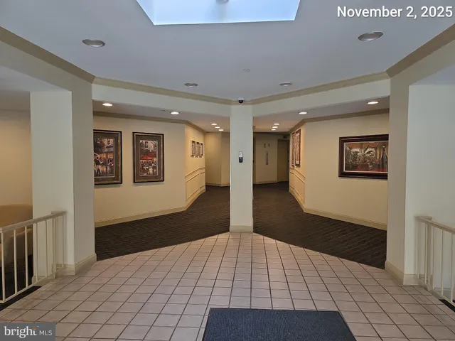 a view of a hallway with a glass door