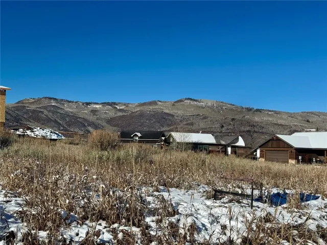 a view of a lake with mountains in the background