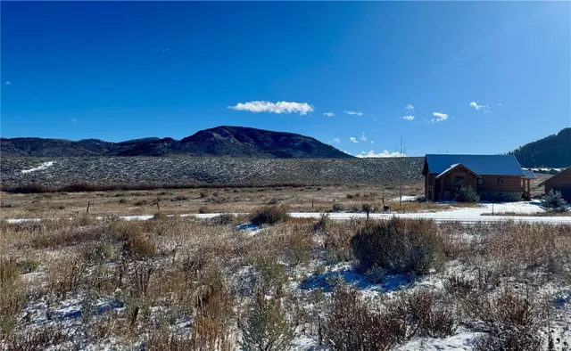 a view of a yard with a fire pit