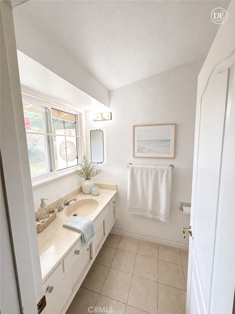 11582 Foster Road Los Alamitos, CA 90720 - Photo 22 of 26 2nd Bathroom
Note: This photo has been digitally enhanced by AI
